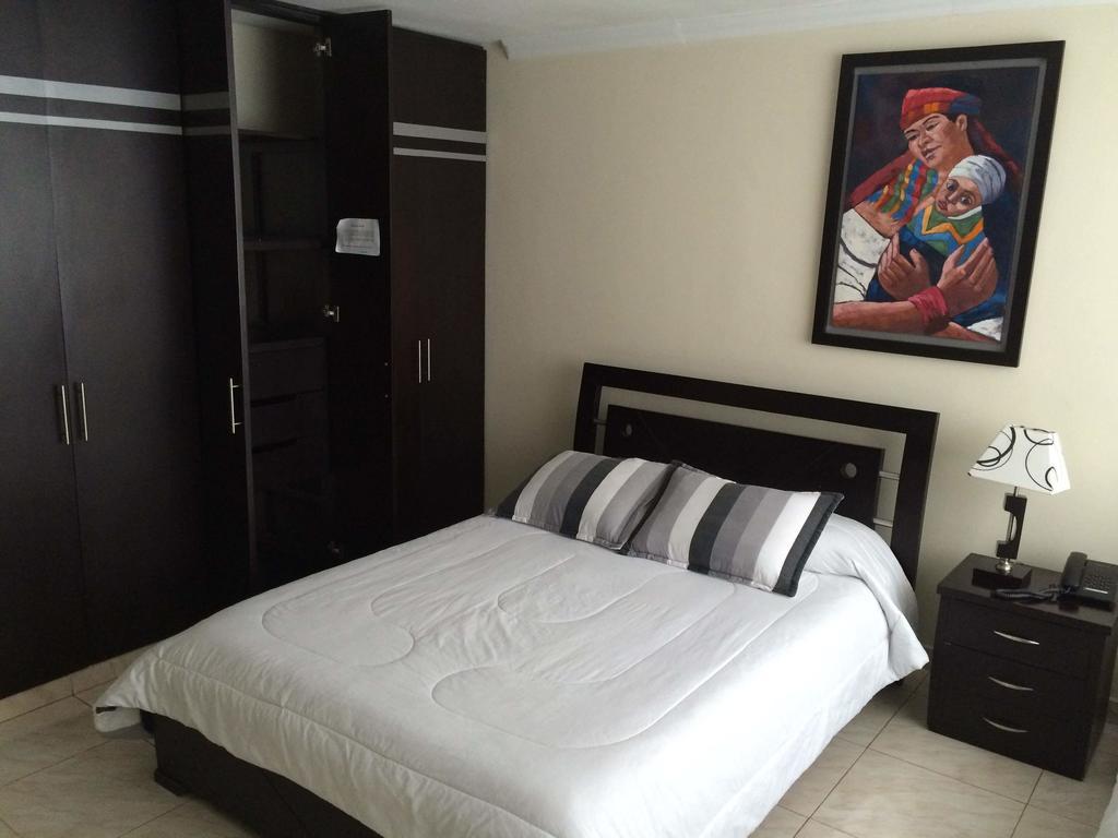 Hotel Sweet Home Bogotá Quarto foto
